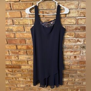 Ursula blue midi dress with sheer floral neck line and ruffled bottom size 8